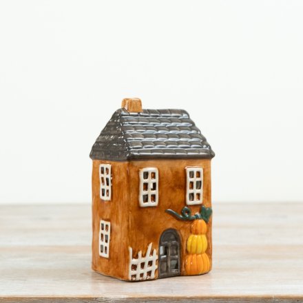 Candle House with pumpkins